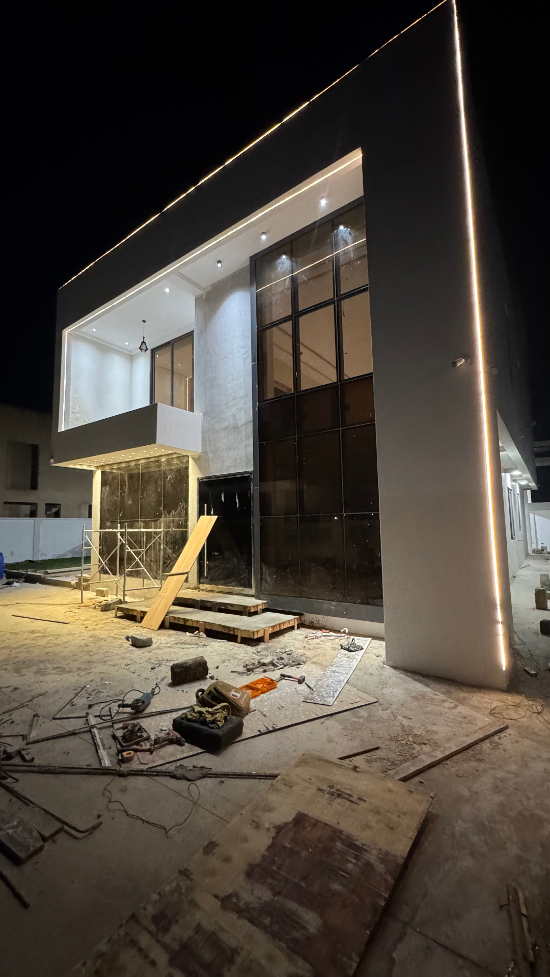 Contemporary home at night with LED accents